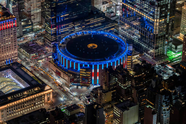 Top 10 Largest NBA Arenas: A night view of Madison Square Garden from above on March 21, 2023 in New York City.