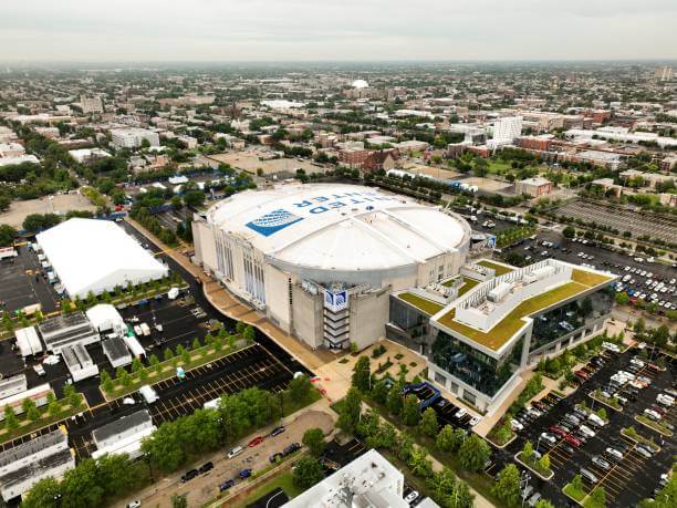 Top 10 Largest NBA Arenas: A general overall aerial view of the United Center and the skyline in Chicago, Illinois, on August 1, 2024.