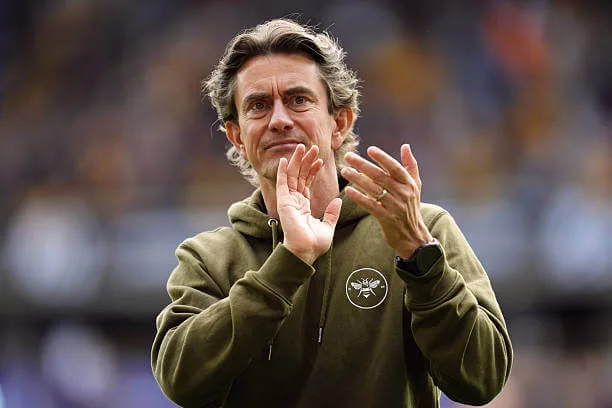 Thomas Frank applauds the Brentford fans following the Brentford's last Premier League match of the season against Wolves at the Molineux Stadium on May 25, 2025.